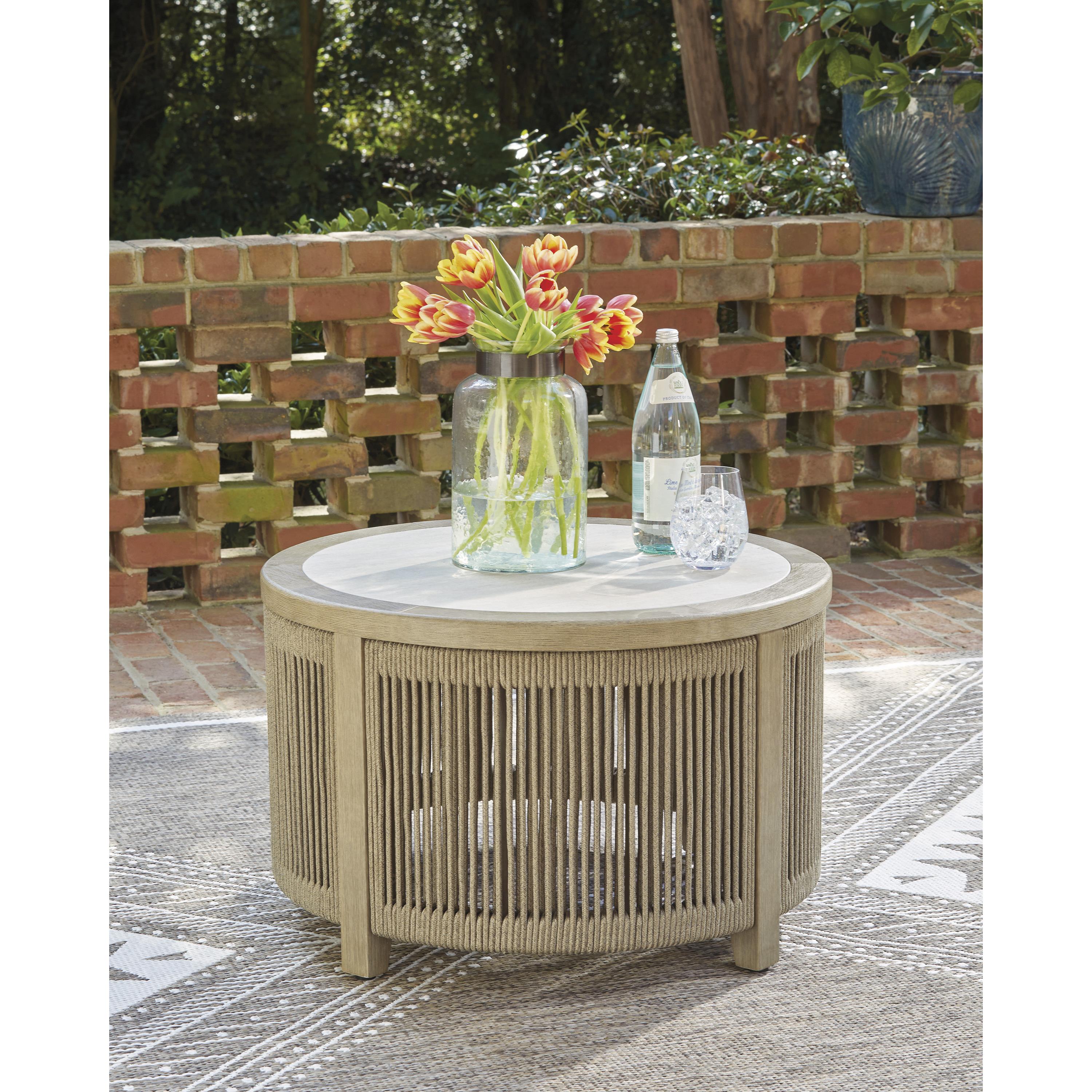 Signature Design by Ashley Spooners Cove PCP469-708 Round Cocktail Table IMAGE 4